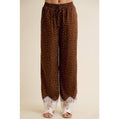 Brown satin wide leg pants with white polka dots and lace trim at the hem.